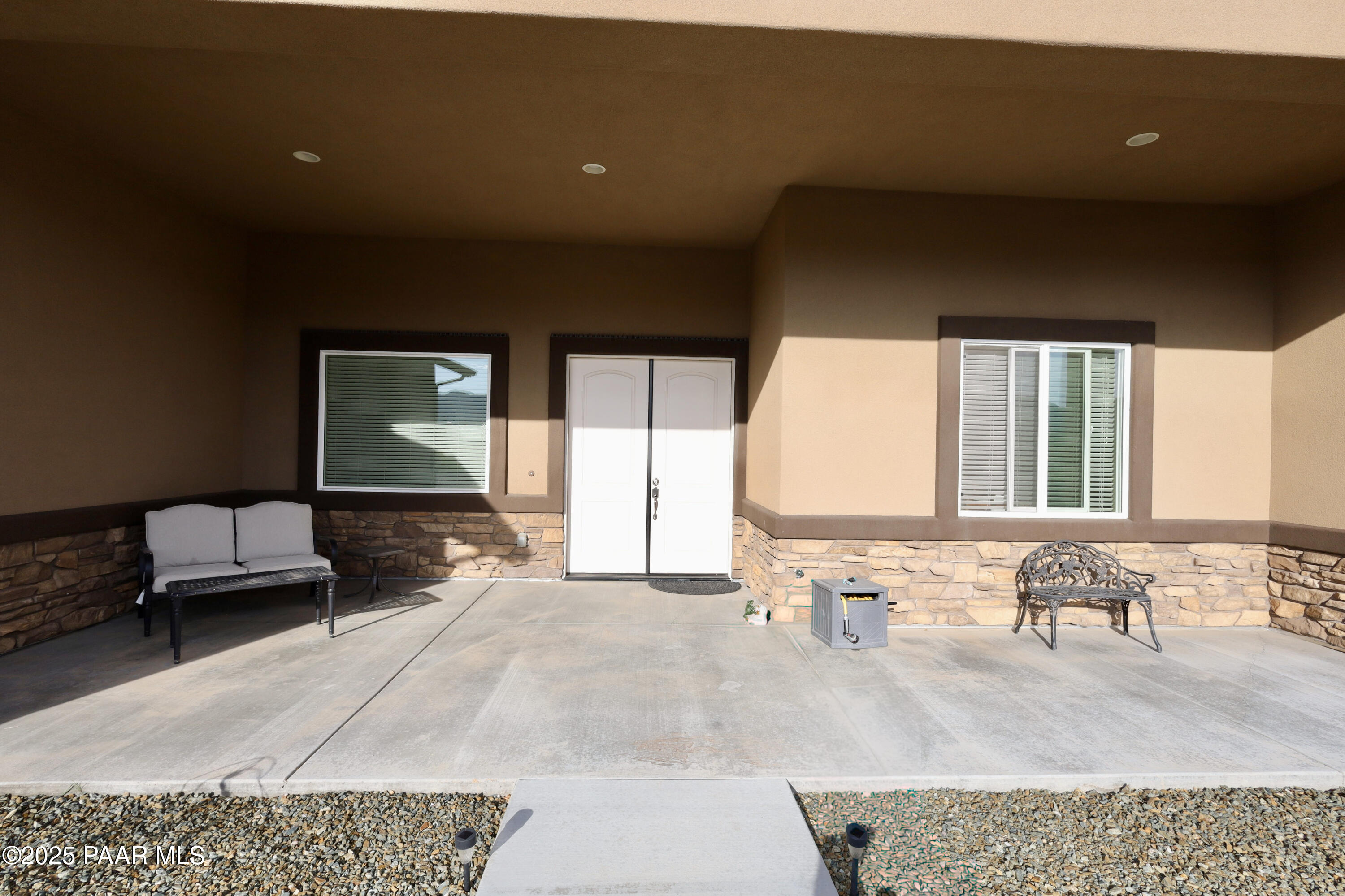 9860 North Loper Road Prescott Valley, AZ 86315 - Photo 8 of 53 a living room with furniture and a large window