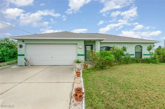 a front view of house with yard