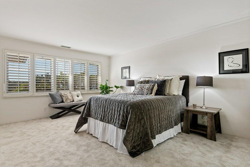 861 Deerpath Road Santa Barbara, CA 93108 - Photo 8 of 24 a spacious bedroom with a bed and wooden floor