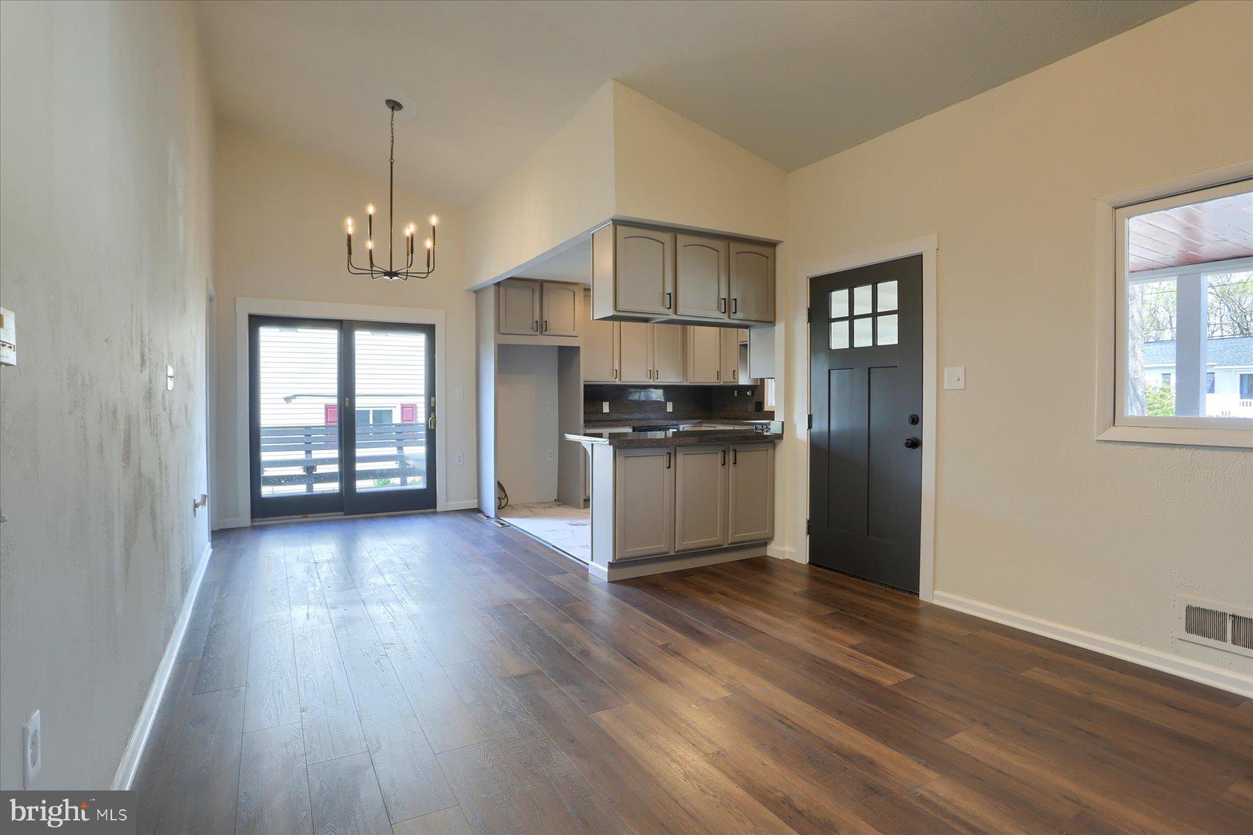 714 Edison Road Dauphin, PA 17018 - Photo 13 of 44 a view of a kitchen with a sink dishwasher cabinets and wooden floor
