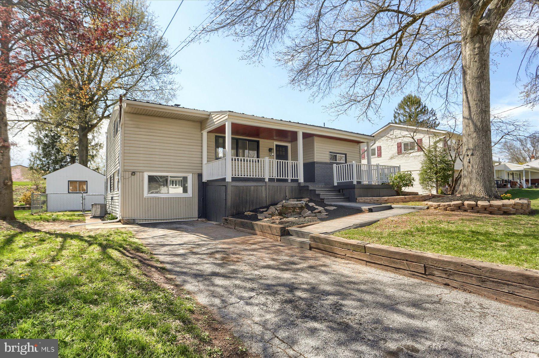 714 Edison Road Dauphin, PA 17018 - Photo 2 of 44 a view of a house with backyard and sitting area