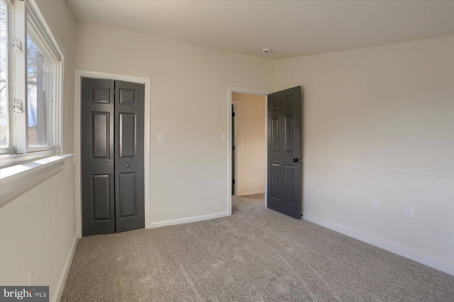 714 Edison Road Dauphin, PA 17018 - Photo 22 of 44 an empty room with windows and closet