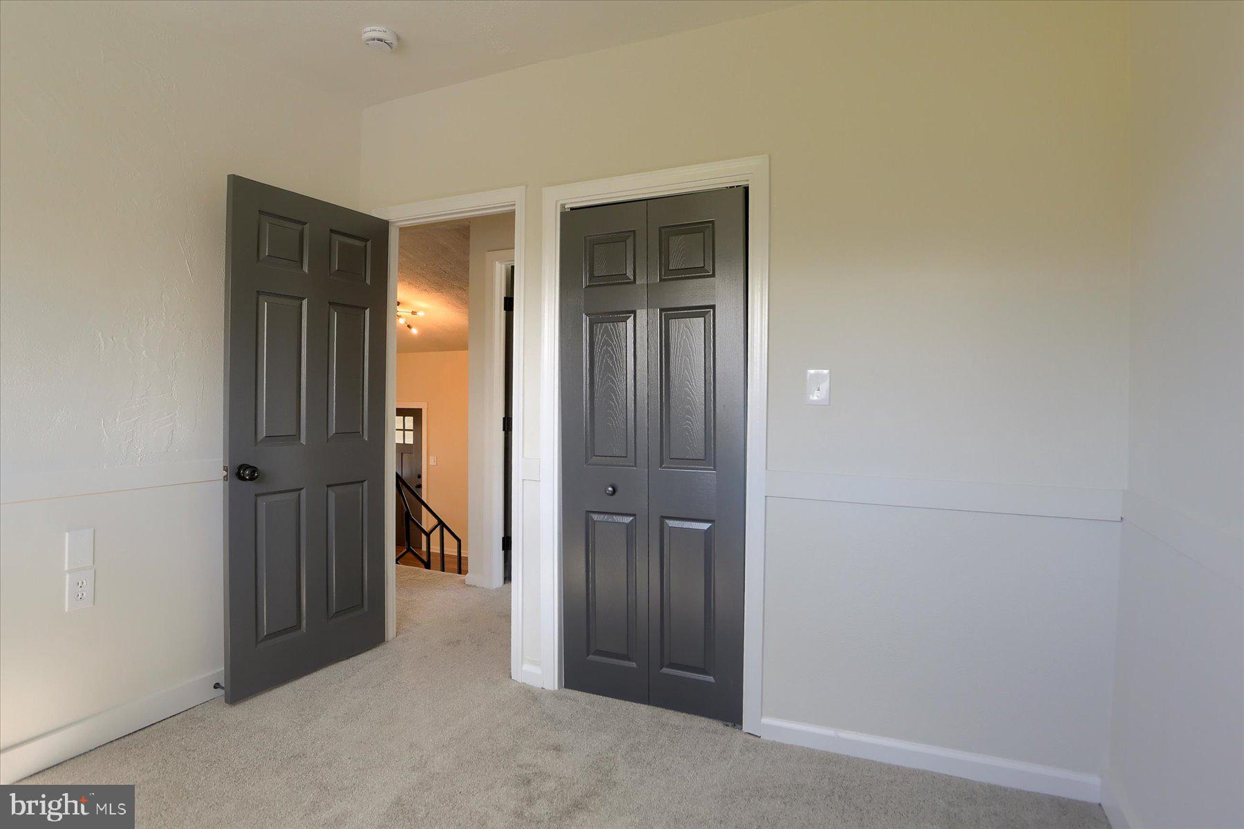 714 Edison Road Dauphin, PA 17018 - Photo 24 of 44 an empty room with closet and wooden floor