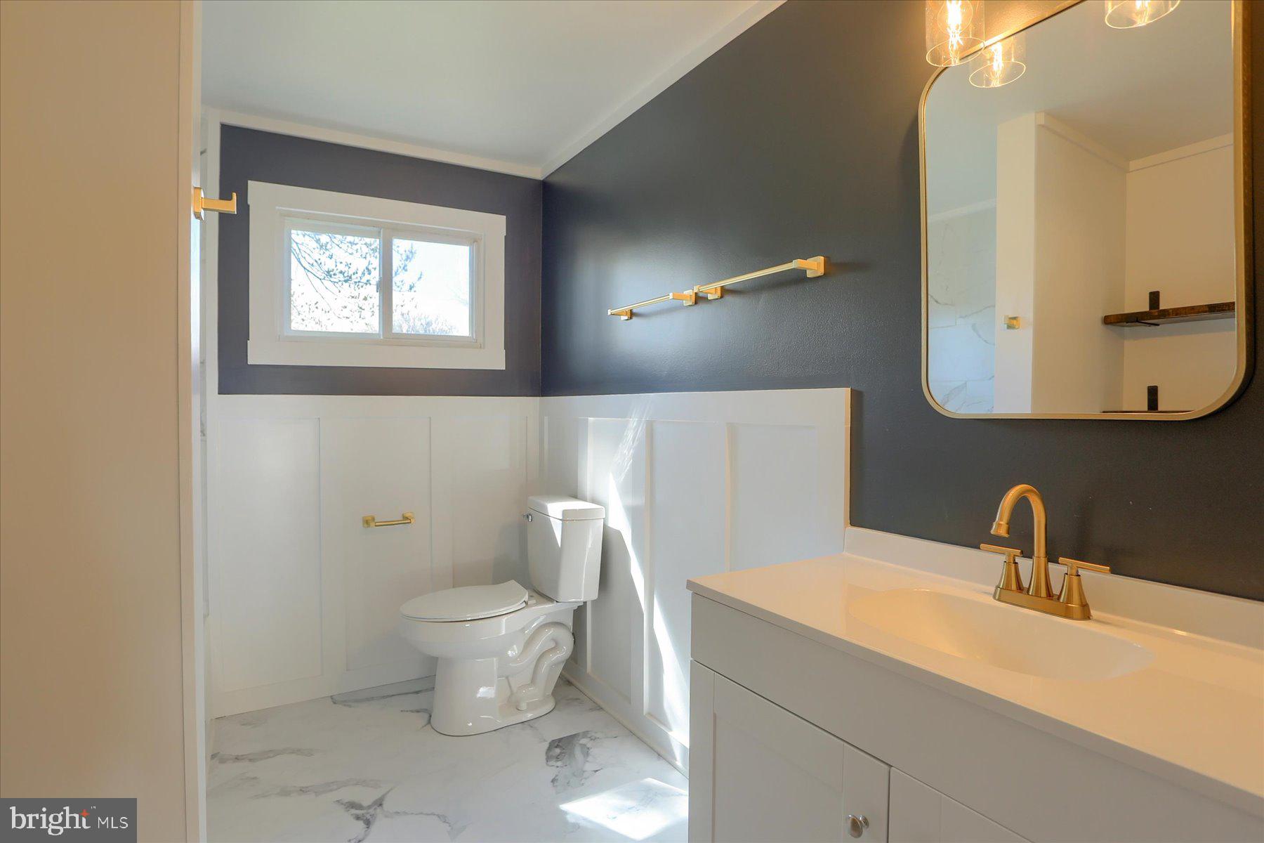 714 Edison Road Dauphin, PA 17018 - Photo 26 of 44 a bathroom with a toilet sink and mirror