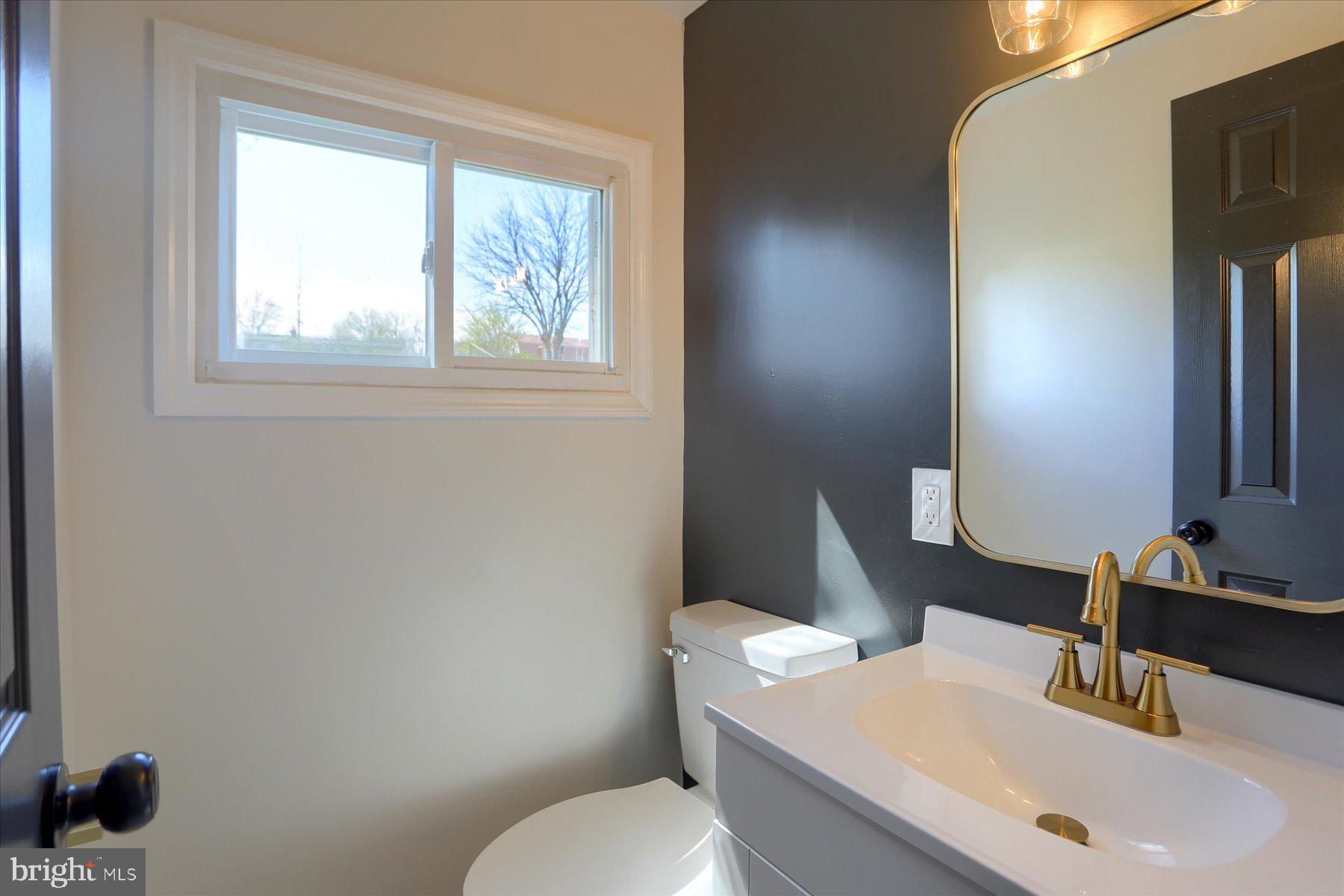 714 Edison Road Dauphin, PA 17018 - Photo 32 of 44 a bathroom with a sink a toilet and mirror