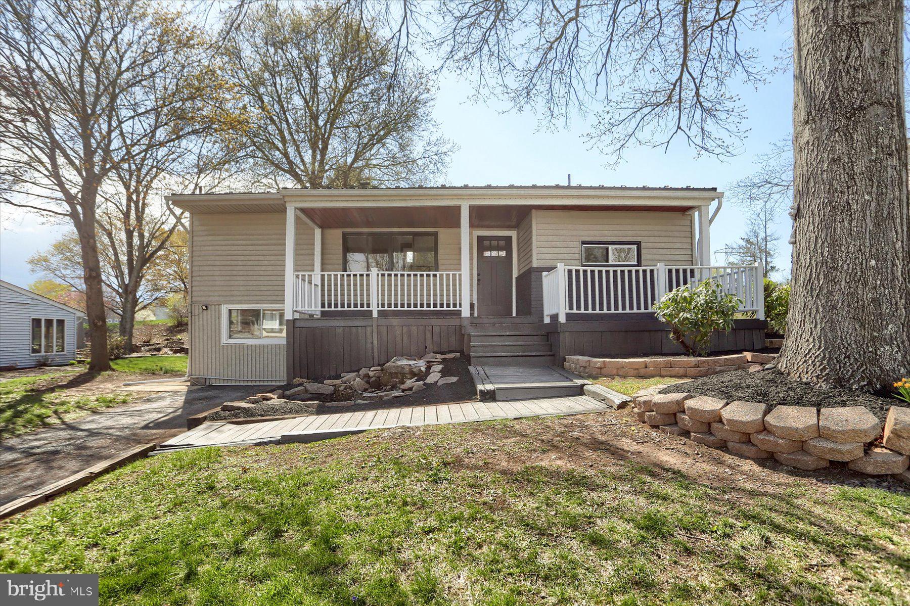 714 Edison Road Dauphin, PA 17018 - Photo 34 of 44 a backyard of a house with yard and outdoor seating