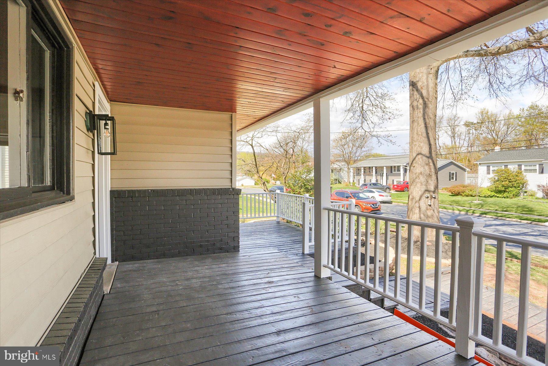 714 Edison Road Dauphin, PA 17018 - Photo 35 of 44 a view of porch with wooden floor