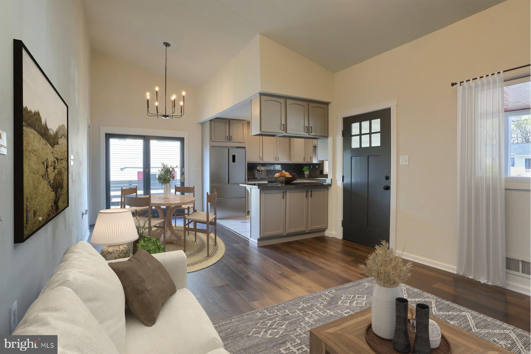714 Edison Road Dauphin, PA 17018 - Photo 4 of 44 a living room with stainless steel appliances kitchen island granite countertop furniture and a flat screen tv