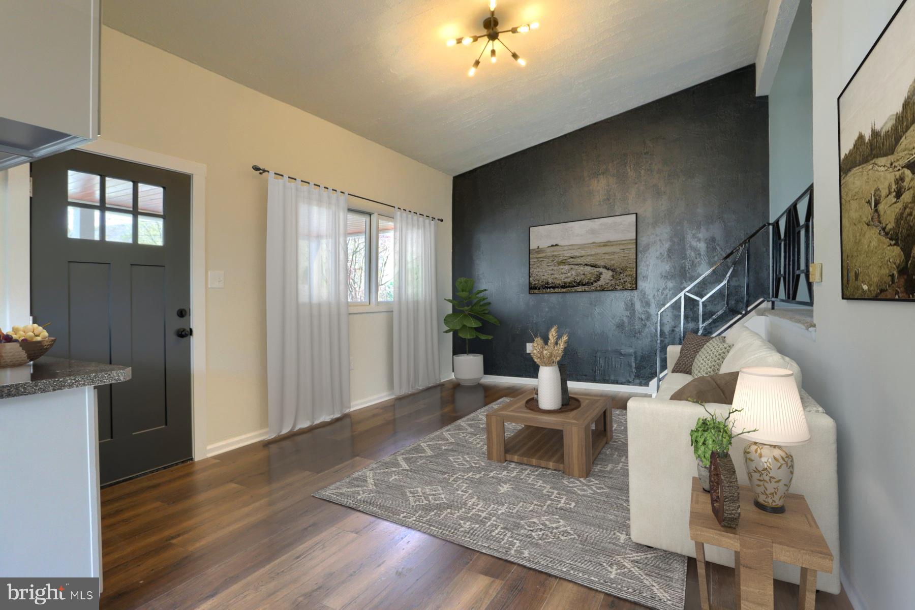 714 Edison Road Dauphin, PA 17018 - Photo 7 of 44 a living room with furniture and wooden floor