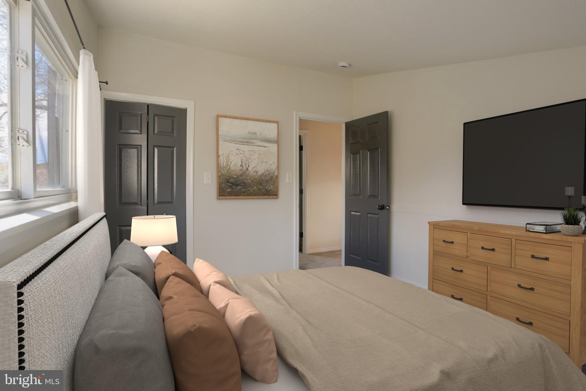 714 Edison Road Dauphin, PA 17018 - Photo 9 of 44 a bedroom with a bed and a flat screen tv