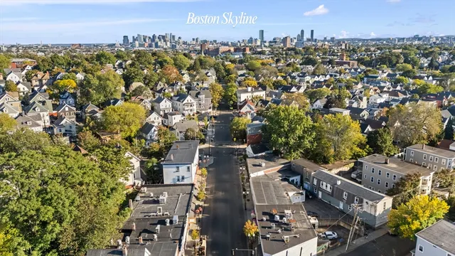 an aerial view of a city with lots of residential buildings