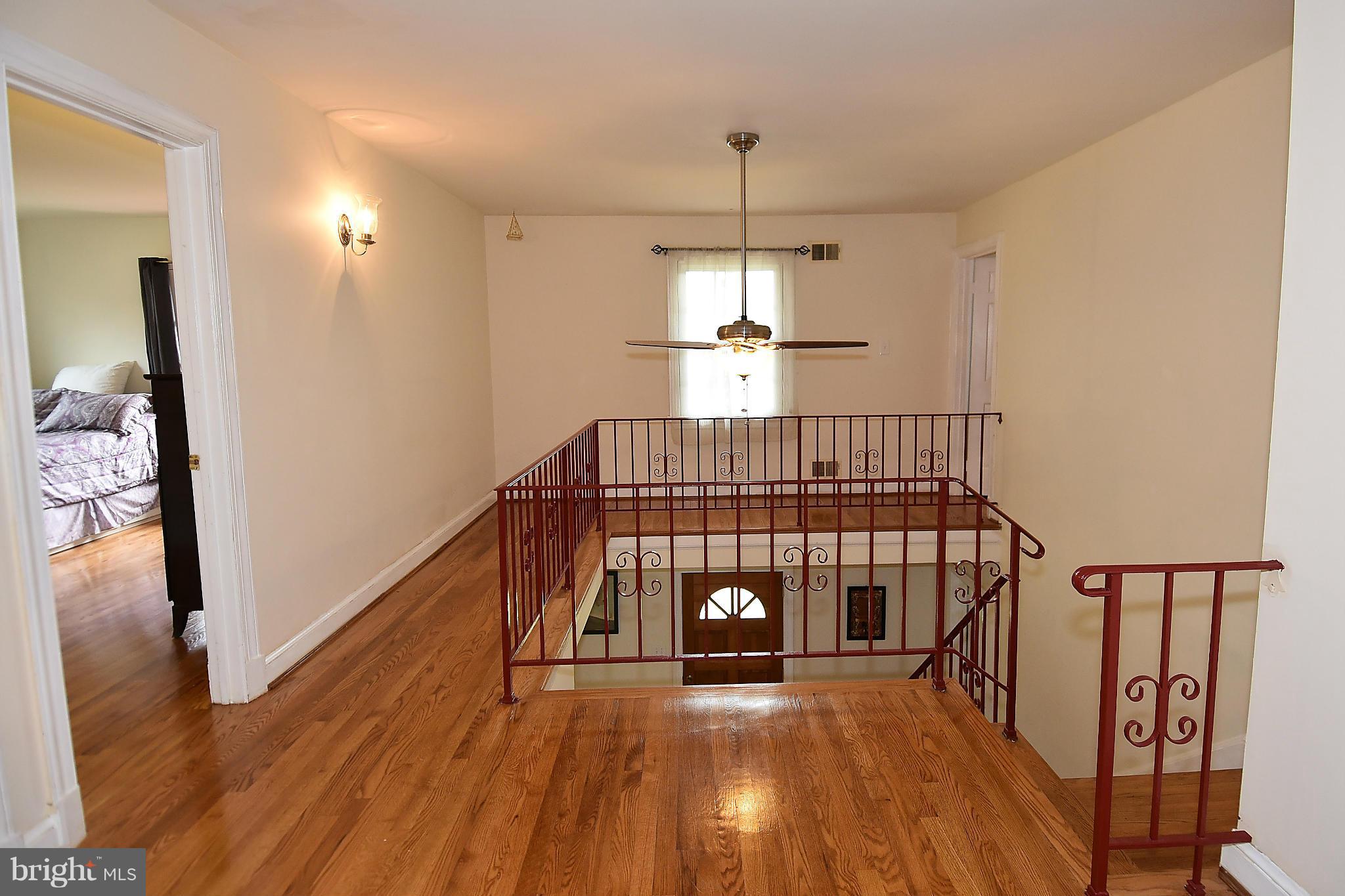 17939 Pond Road Ashton, MD 20861 - Photo 15 of 29 a view of an entryway with wooden floor
