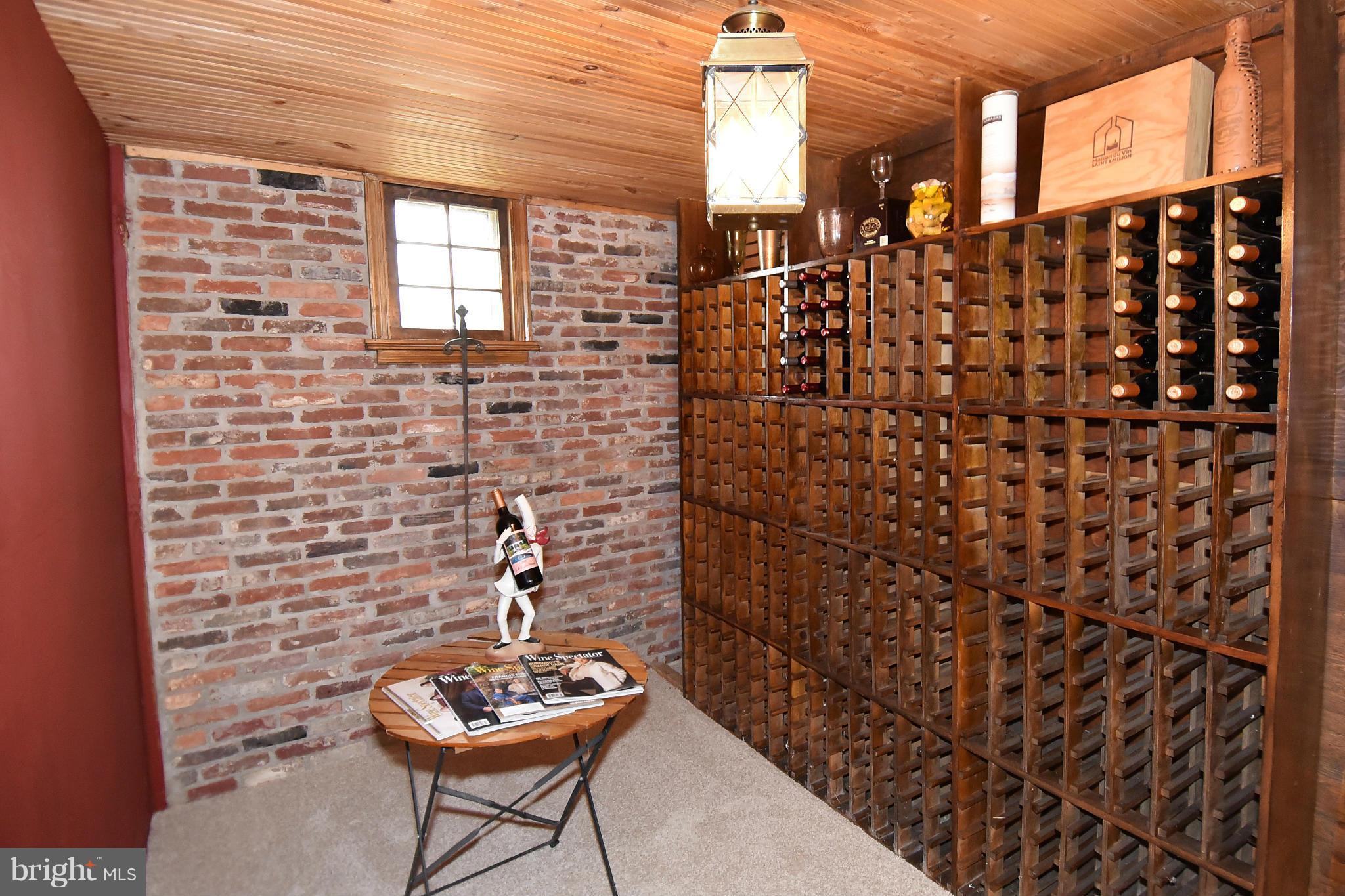 17939 Pond Road Ashton, MD 20861 - Photo 23 of 29 a view of a brick wall with seating area