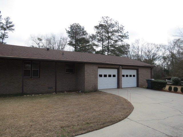 6974 Columbus Road Lizella, GA 31052 - Photo 16 of 19 a house view with a outdoor space
