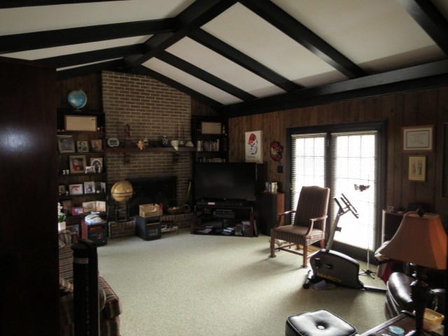 6974 Columbus Road Lizella, GA 31052 - Photo 5 of 19 a room with gym equipment and a large window
