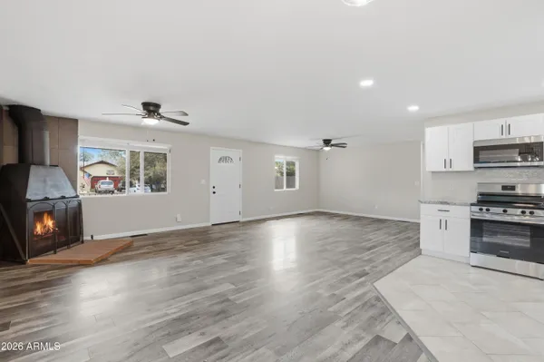 a view of a kitchen with furniture and a kitchen