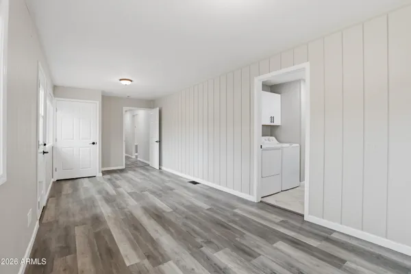 a view of a livingroom with wooden floor