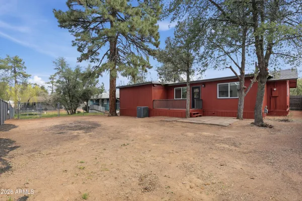 a house with trees in front of it