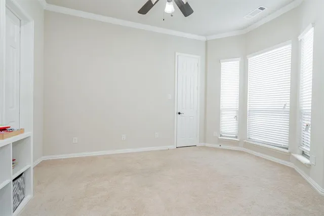 a workspace with furniture and window