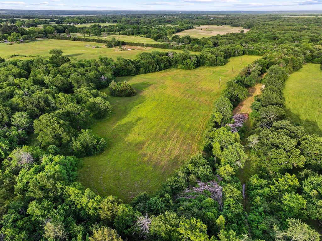 Tbd-2 Singletree Road Denison, TX 75021 - Photo 18 of 23 a view of a garden with a lake