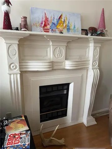 a stove top oven sitting inside of a kitchen