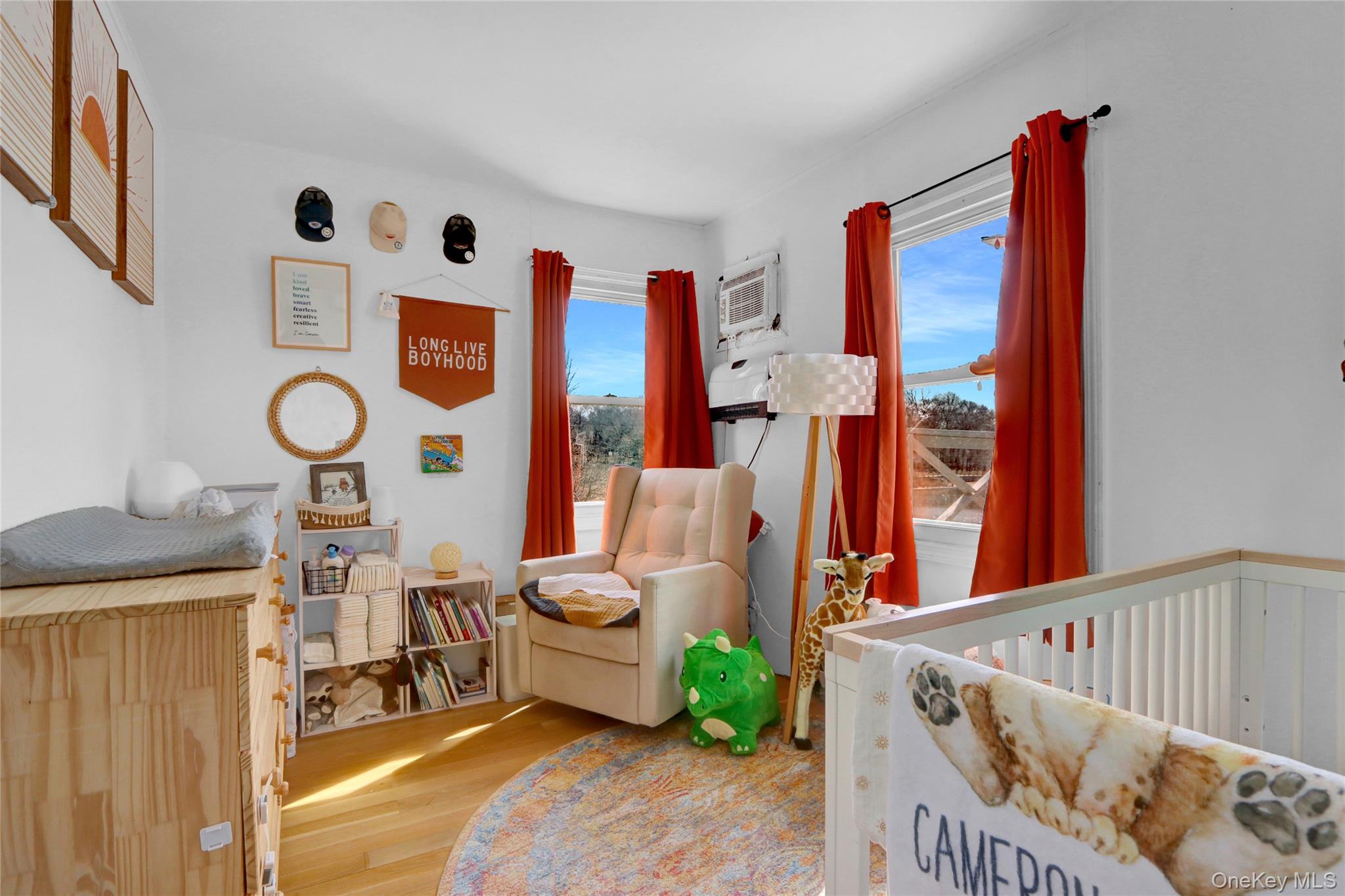 243 Lakeside Trail Ridge, NY 11961 - Photo 17 of 38 a front view of a house with outdoor seating