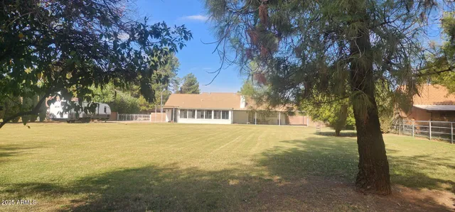 front view of a house with a small yard