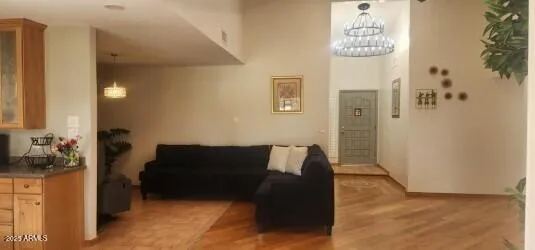 a living room with furniture and a gate