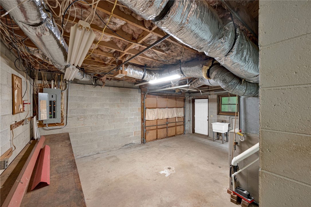 237 Spring Valley Road Liberty, SC 29657 - Photo 24 of 50 A utilitarian basement provides ample storage and workshop space.