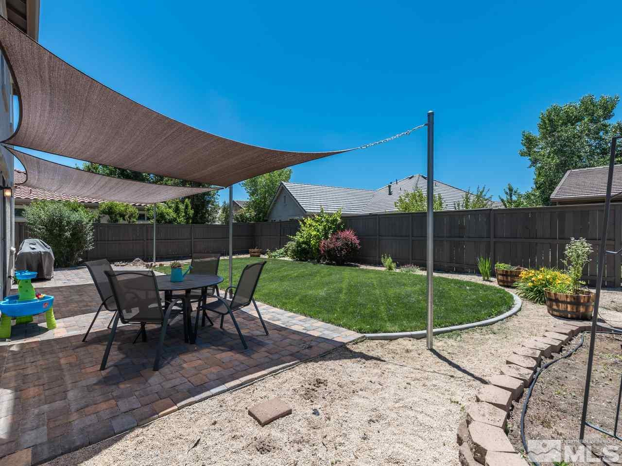 460 Miesque Court Reno, NV 89521 - Photo 23 of 25 a view of a backyard with sitting area furniture and garden