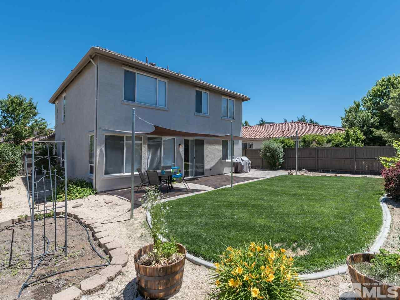 460 Miesque Court Reno, NV 89521 - Photo 24 of 25 a front view of house with yard and seating area