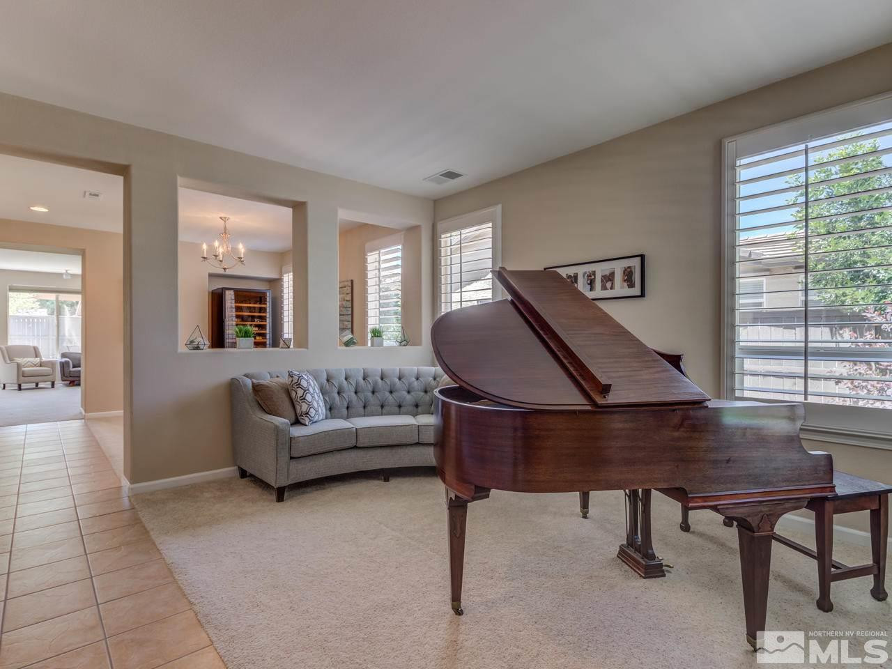 460 Miesque Court Reno, NV 89521 - Photo 3 of 25 a living room with furniture and a window