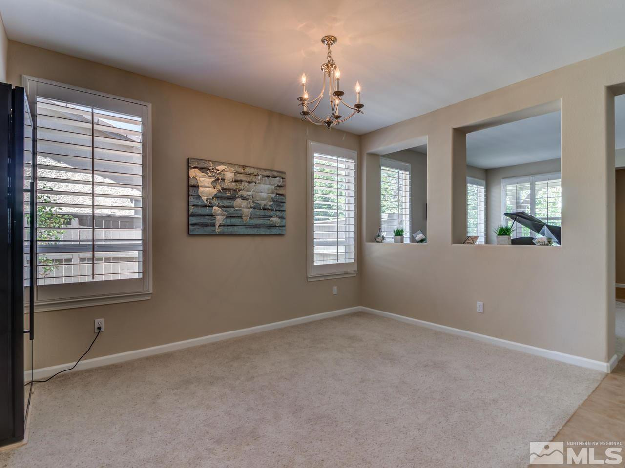 460 Miesque Court Reno, NV 89521 - Photo 5 of 25 a view of an empty room with a window