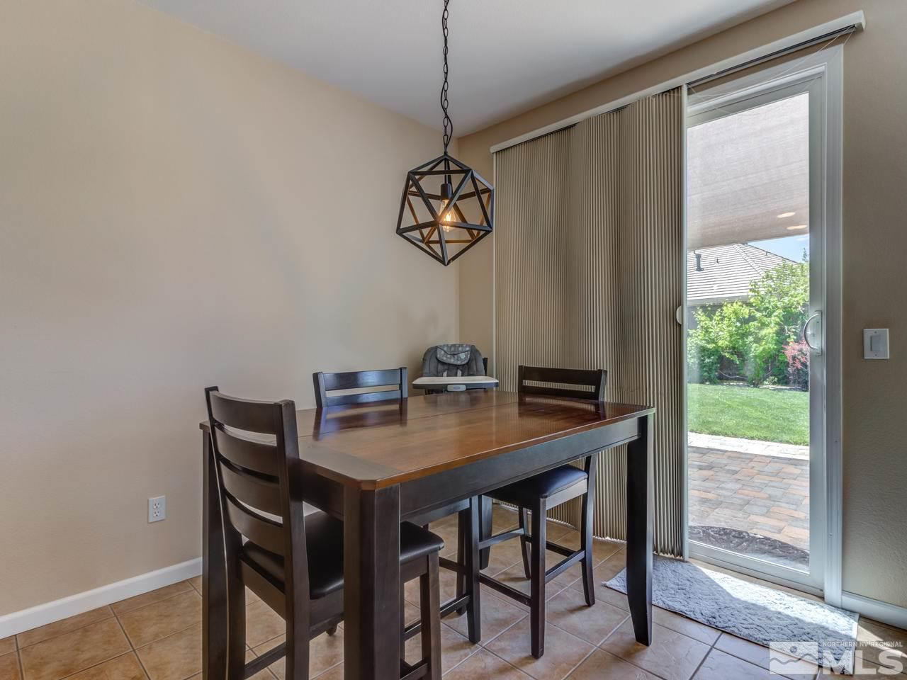 460 Miesque Court Reno, NV 89521 - Photo 9 of 25 a dining room with a table and chairs