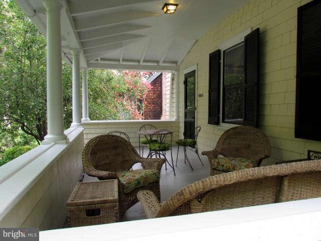 4815 Keswick Road Baltimore, MD 21210 - Photo 2 of 30 a living room with furniture and a large window