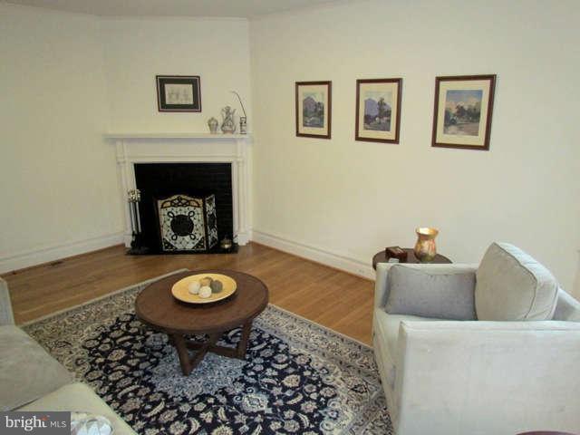 4815 Keswick Road Baltimore, MD 21210 - Photo 12 of 30 a living room with a fireplace