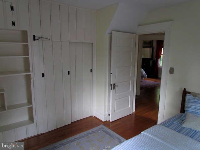 4815 Keswick Road Baltimore, MD 21210 - Photo 20 of 30 a view of a hallway with wooden floor and closet