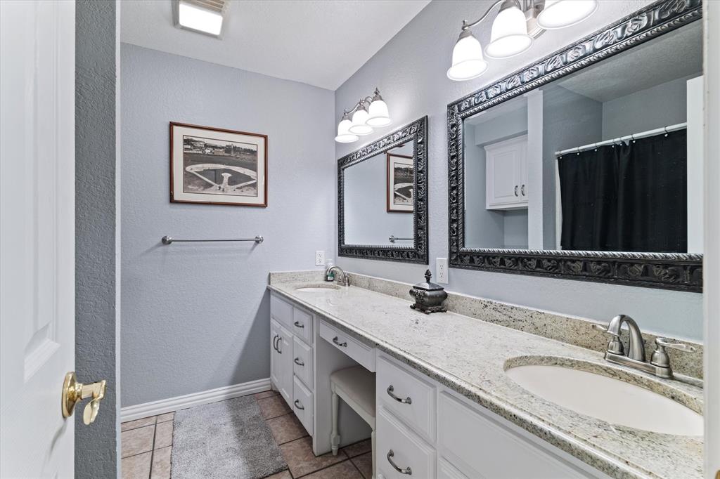 20175 Willow Glade Circle Pilot Point, TX 76258 - Photo 19 of 32 Bathroom with vanity and tile patterned floors