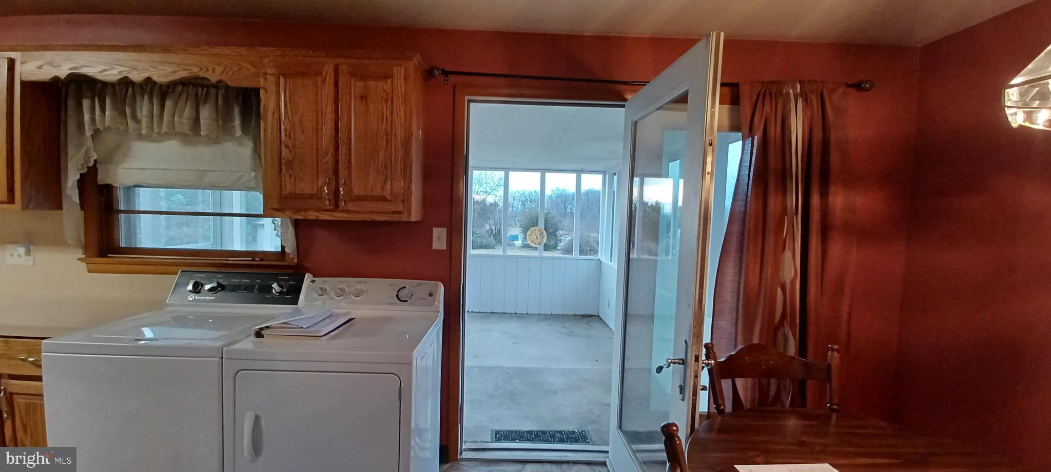 396 Zarger Road Chambersburg, PA 17202 - Photo 14 of 23 door to screened in porch from dining area