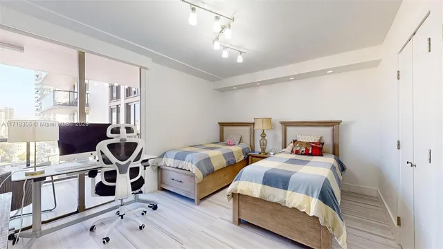 a bathroom with a sink toilet a mirror and vanity