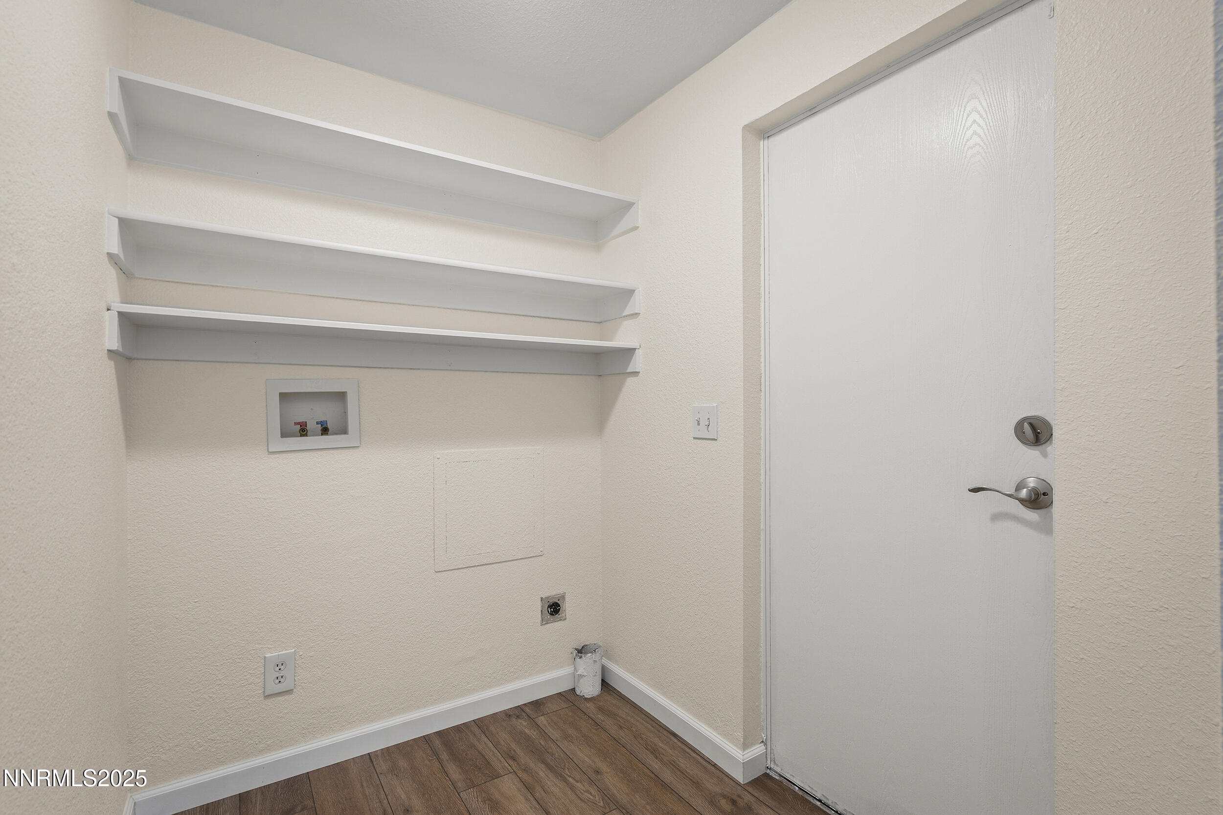 17855 Blackbird Drive Reno, NV 89508 - Photo 19 of 26 a view of a room with wooden floor