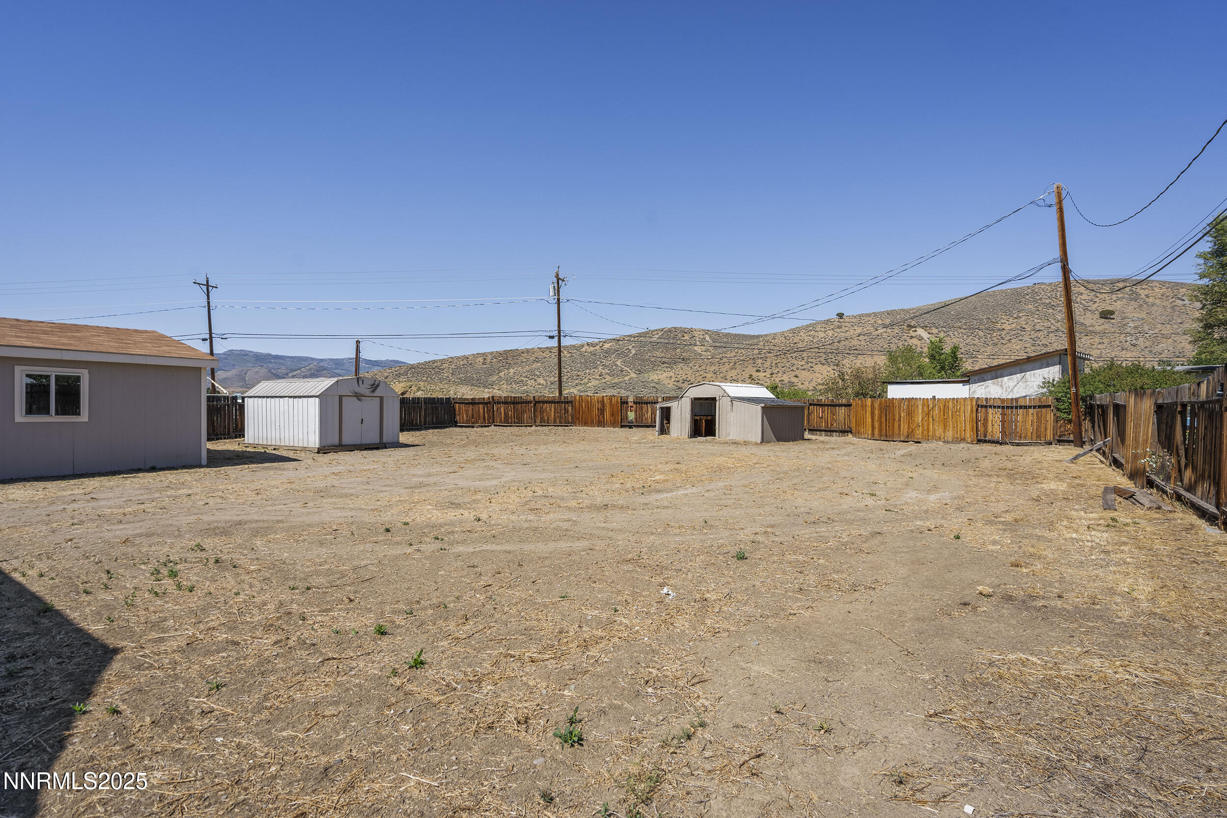 17855 Blackbird Drive Reno, NV 89508 - Photo 21 of 26 a front view of a house with a yard