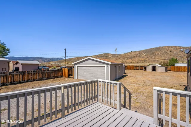 a view of a house with a roof deck