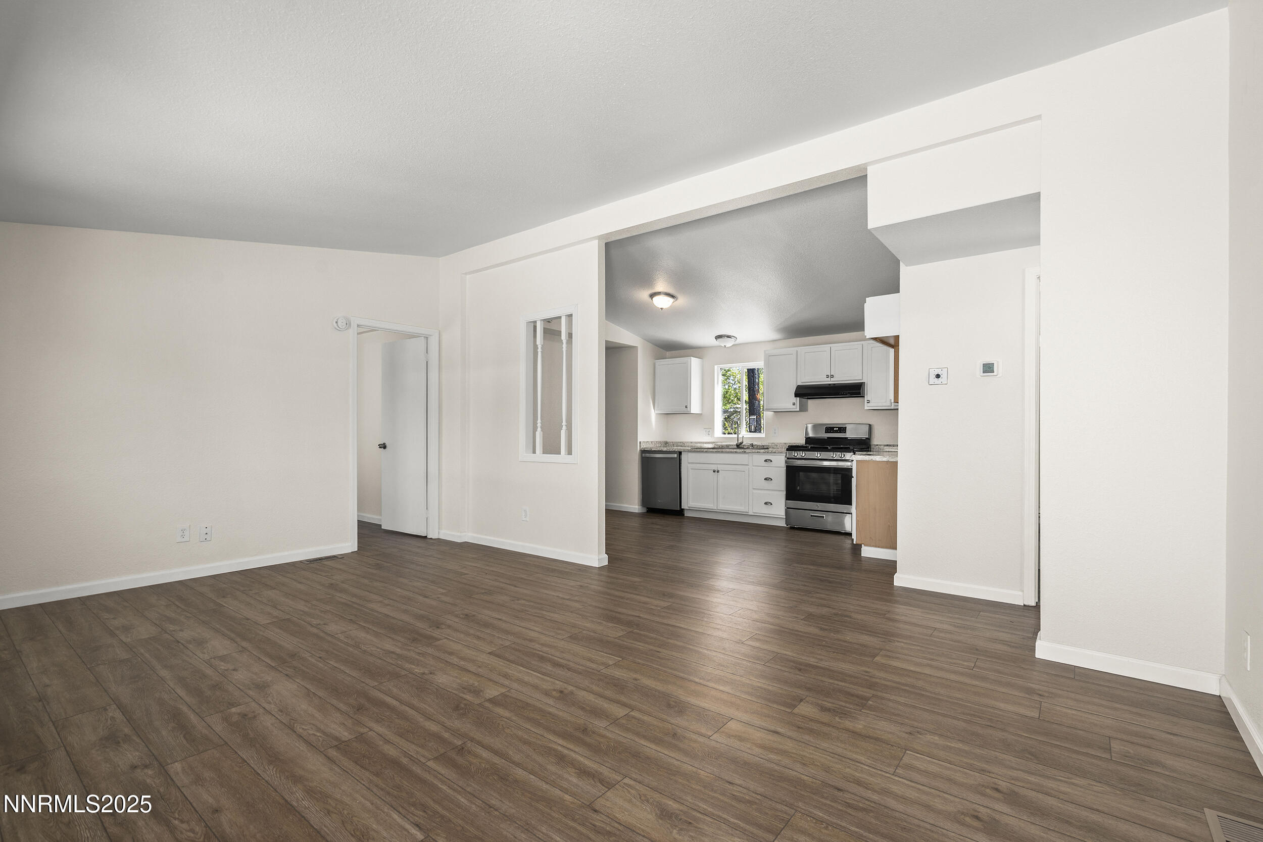 17855 Blackbird Drive Reno, NV 89508 - Photo 3 of 26 a view of kitchen with wooden floor