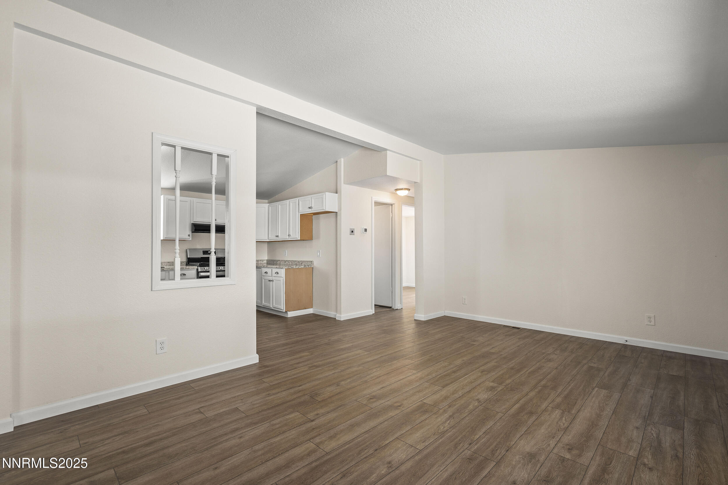 17855 Blackbird Drive Reno, NV 89508 - Photo 5 of 26 a view of empty room with wooden floor