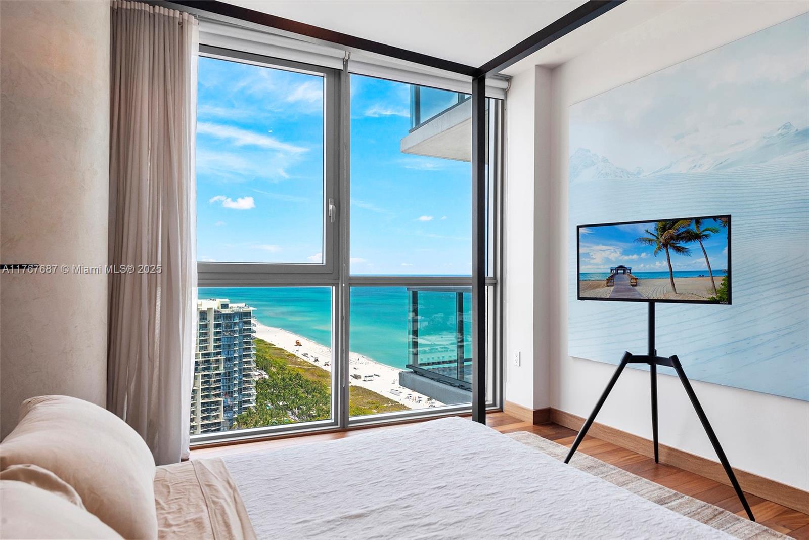 101 20th Street, Unit 3105 Miami Beach, FL 33139 - Photo 22 of 34 a view of a room with workspace window and wooden floor