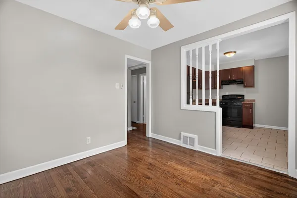 a kitchen with stainless steel appliances granite countertop a refrigerator stove top oven and sink