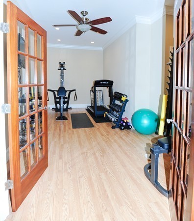 26 Cider Circle Bolton, MA 01740 - Photo 19 of 30 a room with furniture and a chandelier