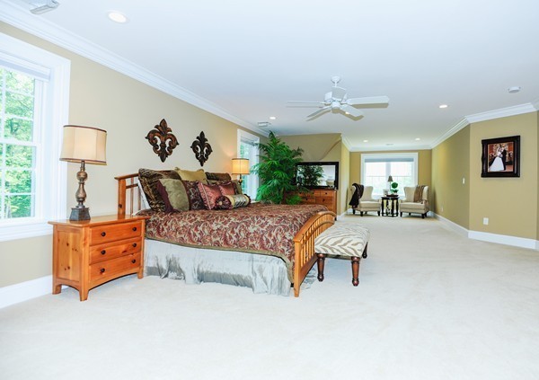26 Cider Circle Bolton, MA 01740 - Photo 21 of 30 a bedroom with a bed couch and window