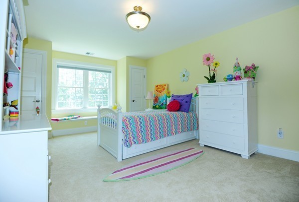 26 Cider Circle Bolton, MA 01740 - Photo 26 of 30 a bed room with a bed and a window